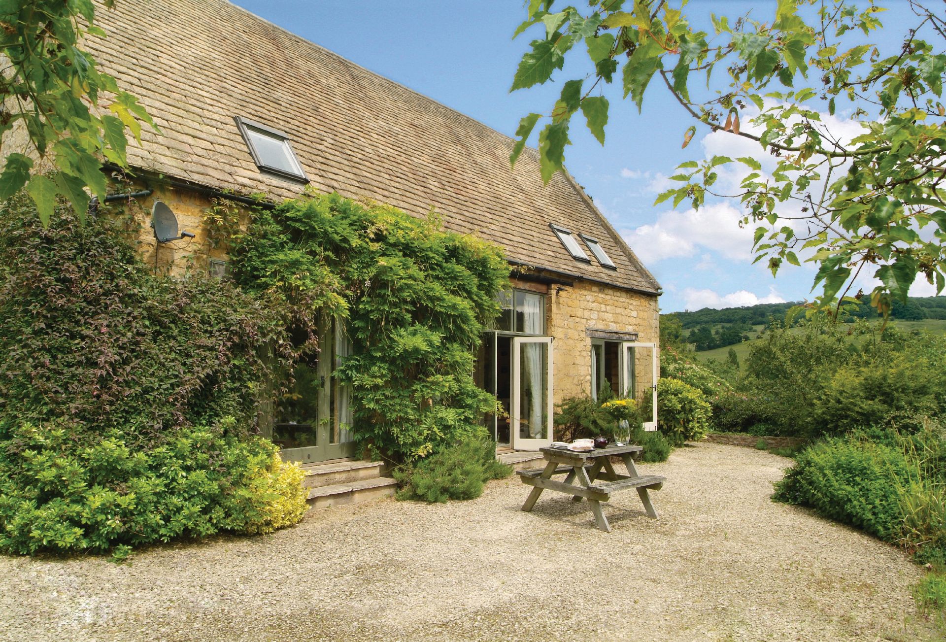 Gloucestershire Cottage Holidays - Click here for more about Buckland Wood Barn