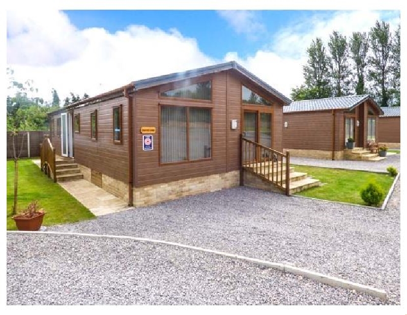 Gloucestershire Cottage Holidays - Click here for more about Squirrel Lodge at Woodlands View