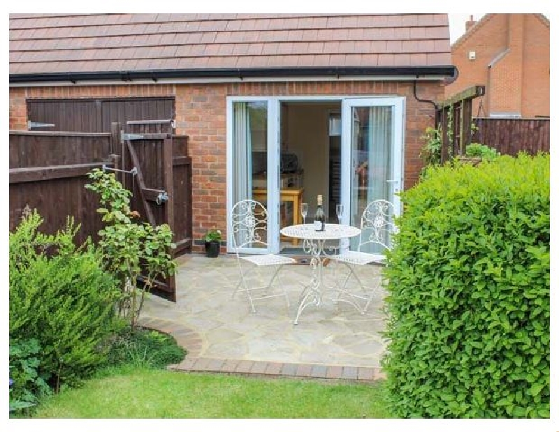 Lincolnshire Cottage Holidays - Click here for more about The Herb Garden