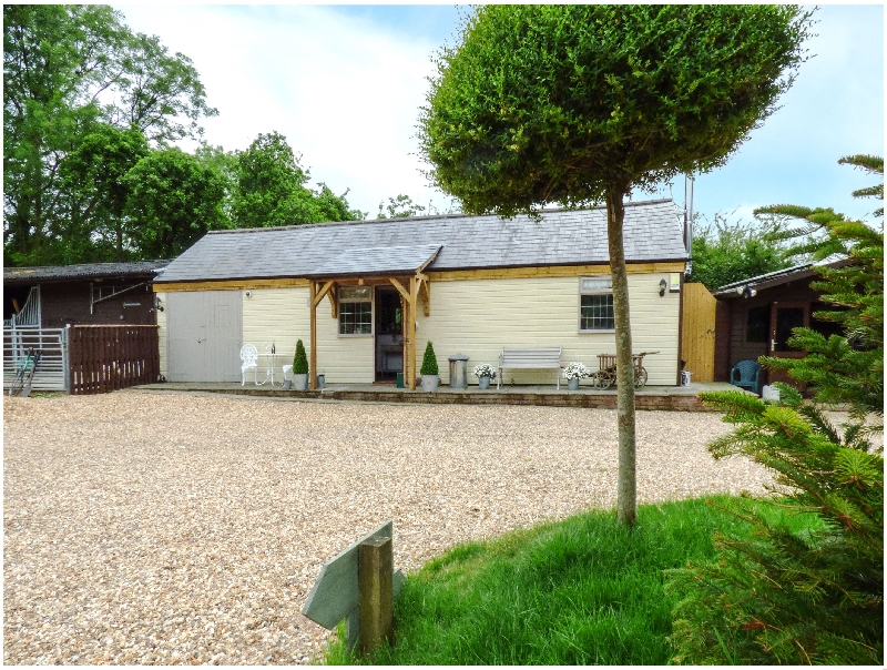 Dorset Cottage Holidays - Click here for more about Longhouse Lodge