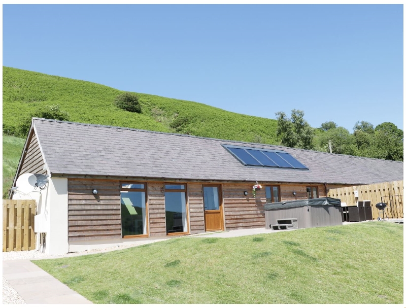 Powys Cottage Holidays - Click here for more about 1 Beacon View Barn