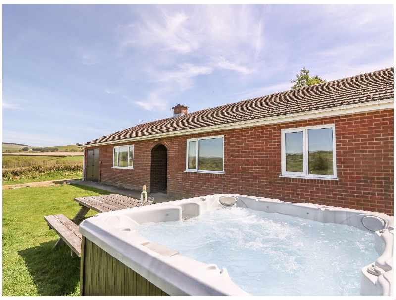 Powys Cottage Holidays - Click here for more about Glanyrafon Bungalow