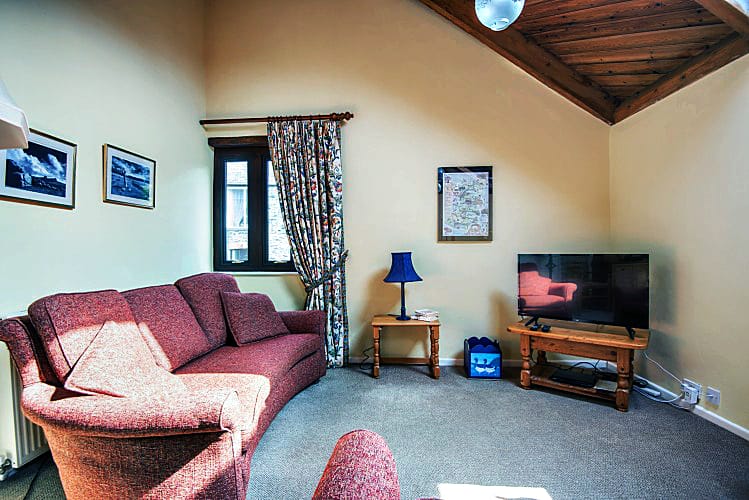 Devon Cottage Holidays - Click here for more about Badger Cottage, White Oxen Manor