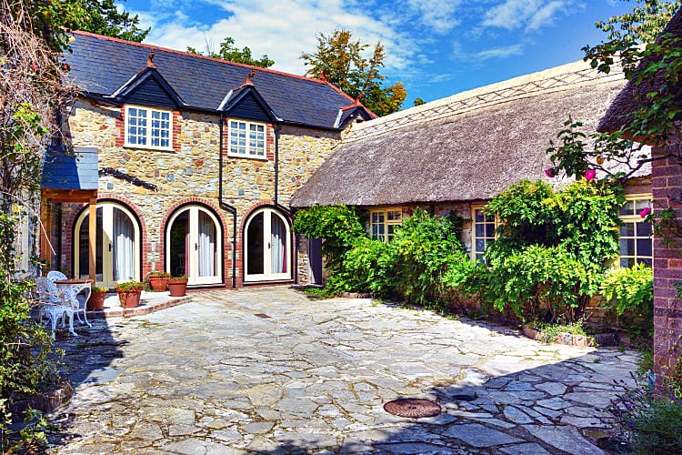 Dorset Cottage Holidays - Click here for more about Courtyard Cottages